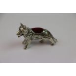 silver pincushion in the form of a dog