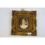 Continental hand painted Portrait on Porcelain of a 19th Century female with ornate Gilt Wooden