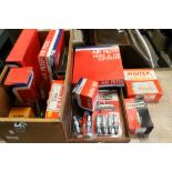 A quantity of car spares including vintage Champion N9Y spark plugs, Unipart air and oil filters,