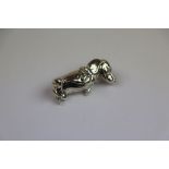 Silver dog brooch