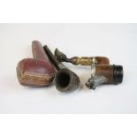 Three vintage pipes, cased Meerschaun, Beugere and one other