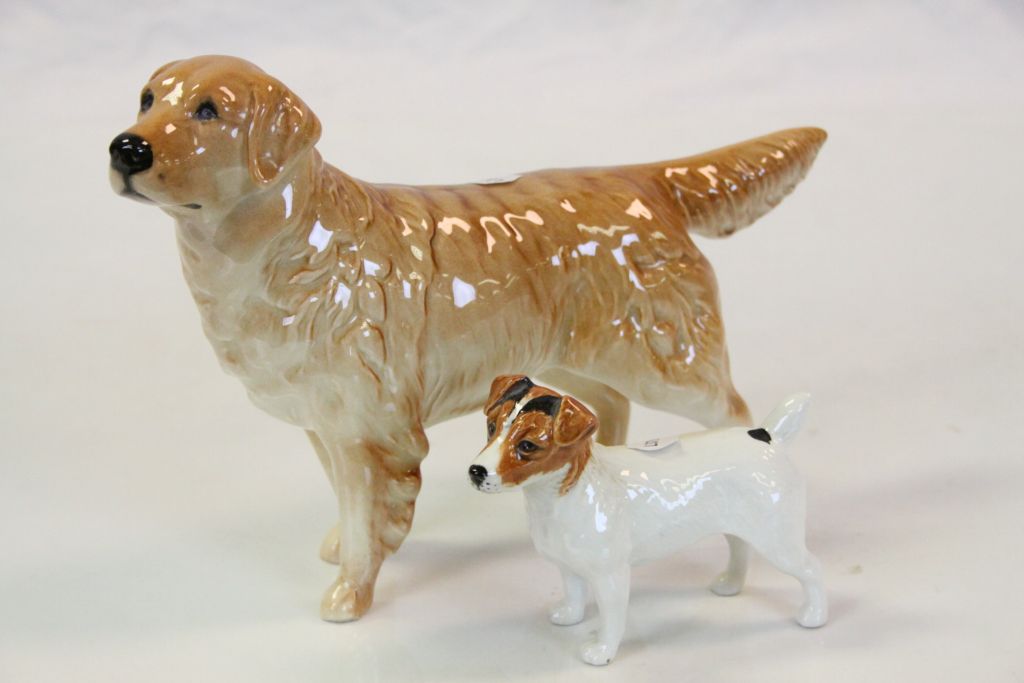 Beswick ceramic model of a Golden Retriever and another of a jack Russell, approx 7cm tall