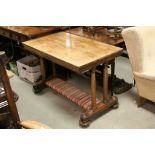 Victorian Rosewood Table raised on Double Turned Supports with Sledge Bases on Castors united by