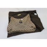 Ladies Gucci Handbag with outer cover, has fabric damage to the bag