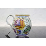 Poole Pottery jug with hand painted Floral decoration, decorator marks for "Hilda Trim" (1926 -