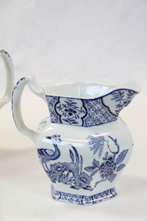 Three Wood & Sons blue & white graduating ceramic Jugs in "Yuan" pattern, the largest approx 17cm - Image 2 of 4