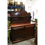 Victorian Mahogany Chiffonier, the shaped upper section with scroll carved decoration and shelf over
