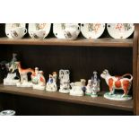 Collection of vintage Staffordshire ceramic figures etc to include a Cow Creamer, Lurcher with
