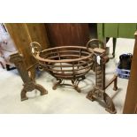Cast metal fire basket and pair of fire dogs