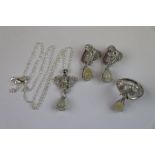 Silver suite of jewellery to include ring, necklace and matching earrings