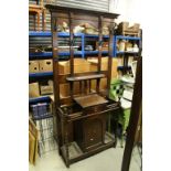 Early 20th century Oak Hall Stand, the upper section with Six Iron Hooks over a Glove Drawer