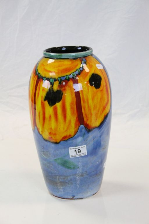 Large Poole Pottery vase with bright abstract Floral decoration and raised Dolphin mark to base,