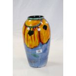 Large Poole Pottery vase with bright abstract Floral decoration and raised Dolphin mark to base,