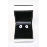 Pair of 18CT White Gold sapphire and diamond earrings of 1CT
