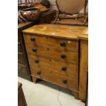 Victorian Pine Chest of Four Long Drawers with Turned Wooden Handles and raised on bracket feet,