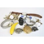 Tin of mixed collectables including silver pocket watch, silver fob, ladies fossil watch, gents