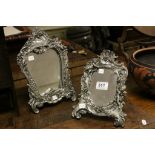Two Cherub decorated Easel Mirrors, both with plaques ' Sterling Silver '