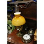 Brass Oil Lamp with Amber Glass Shade together with Three Paperweights made from parts from