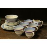 Clarice Cliff Newport Pottery part tea service, Art Deco period to include cups, saucers, side