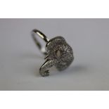 Silver and CZ ring in the form of an Elephant with opal eyes