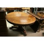William IV Mahogany Circular Tilt Top Centre or Dining Table raised on an Octagonal Column Support
