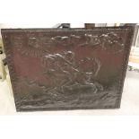 Cast Iron Fire Back with relief decoration depicting a Man riding a Horse, 43cms x 43cms