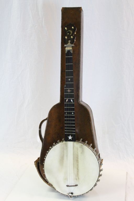 Late 19th Century American "Celebrated Benary" four string Banjo with Mother of Pearl inlay to the