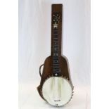 Late 19th Century American "Celebrated Benary" four string Banjo with Mother of Pearl inlay to the