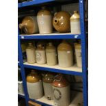 Twelve Stoneware Flagons, Three Stoneware Urns and Three Stoneware Hot Water Bottles, some with