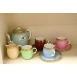 Aynsley ceramic teaset with teapot, cream jug and four cups with three saucers, Teapot with RD