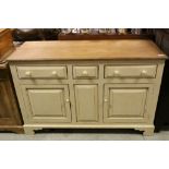 Part painted elm kitchen dresser base with three drawers and two cupboards