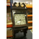 Oak cased wall clock originally a top from a long cased clock with movement of local interest, the