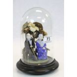 Ceramic elderly couple with nodding heads in a Glass dome with wooden base, dome approx 22.5cm