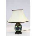 Moorcroft Pottery Lamp with Arts & Crafts style repeated Purple flower decoration, stands approx