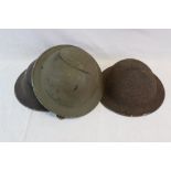 A Collection Of Three Vintage British Military Brodie Helmets, All Complete With Chin Straps.