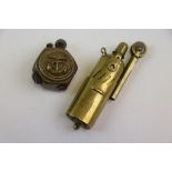 Two Vintage Brass Trench Lighters To Include A Royal Navy Trench Art Example.