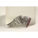 Silver dog head brooch with ruby collar