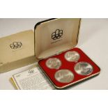 Boxed set of four 1976 Canadian uncirculated Olympic coins, to include 2 x $10 Dollars & 2 x $5