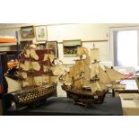 Two hand built models of ships to include HMS Victory and HMS Bounty with cut away cross section