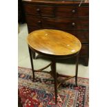 Edwardian Mahogany Inlaid Oval Side Table, the slender square legs united by a pierced shelf,