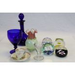 A Thomas Webb blue glass decanter and wine glass, four paperweights to include Caithness ,an art