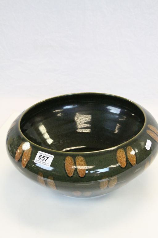 A studio bowl in the style of Poole Pottery, green ground with brown fleck decoration, unmarked - Image 2 of 4