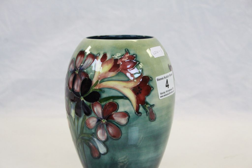 Vintage Moorcroft Pottery vase, hand painted with "Spring Flowers", stands approx 18cm is fully - Image 2 of 6