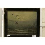 Oil on canvas laid on board with ducks in flight signed and dated 1960