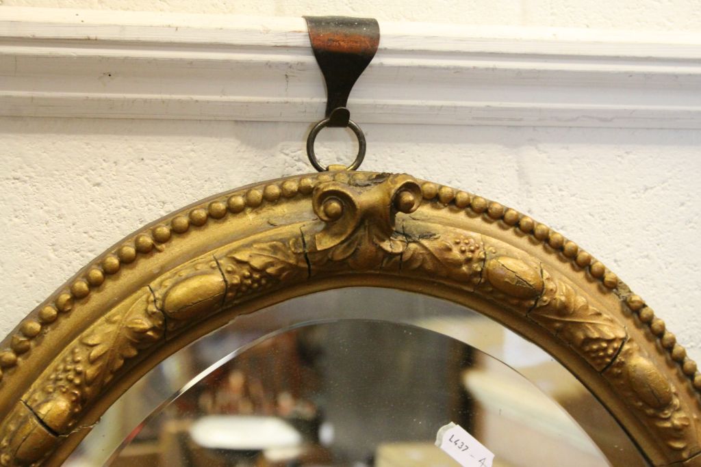 19th century oval Bevelled Glass Mirror with ornate Gilt painted frame & pair of Sconces to base, - Image 3 of 3