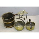 Antique three standing trivet decorated with Prince of Wales plume with an antique Cooper bucket and