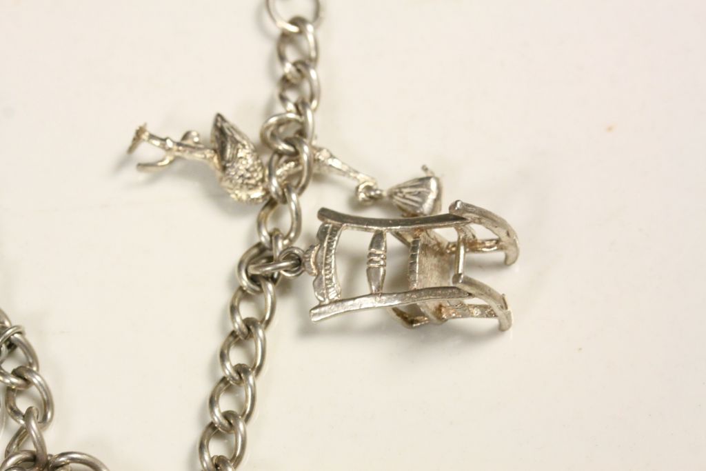 Hallmarked Silver Charm bracelet with various charms to include; Crown, Rocking Chair, Toby Jug etc - Image 3 of 6