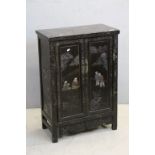 19th century Oriental Black Lacquered Side Cabinet decorated with Figures in a Landscape, 63cms wide