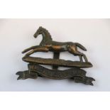 A Bronze The West Yorkshire Regiment OSD Cap Badge With Running Horse And Scroll Below, Three