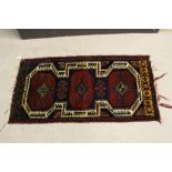 Small Red and Blue Ground Wool Rug, 109cms x 56cms